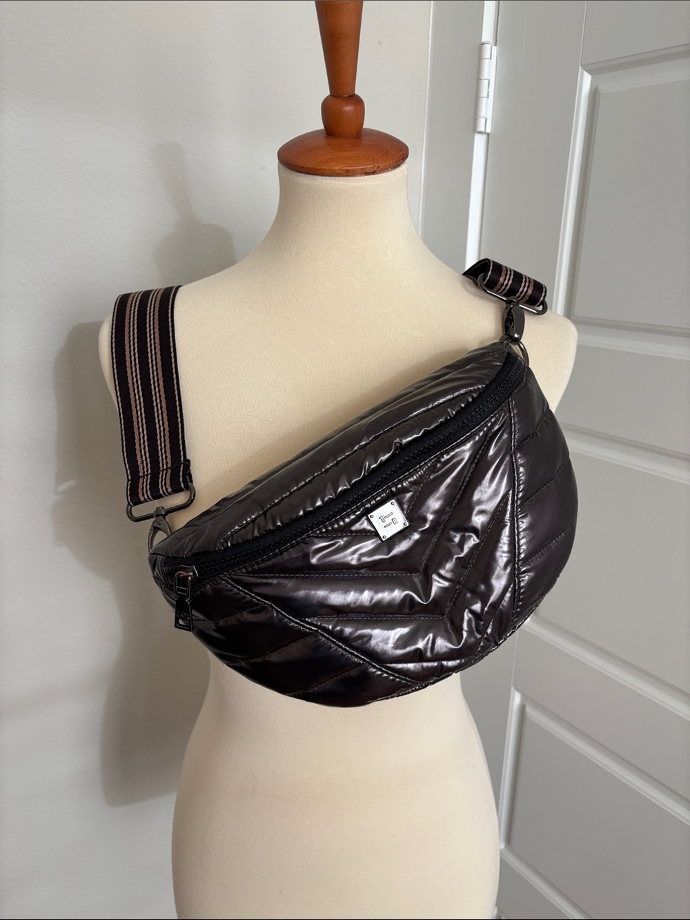 THINK ROYLN Quilted Shiny Burgundy Crossbody Belt Bag with Striped Strap
